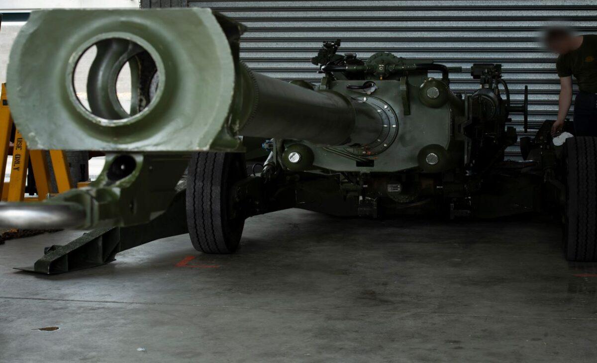An M777 howitzer from 1st Regiment, Royal Australian Artillery, is prepared for transportation before being loaded onto a truck at Gallipoli Barracks, on April 27, in Brisbane, Australia. (Major Roger Brennan, Australian Defence Forces)