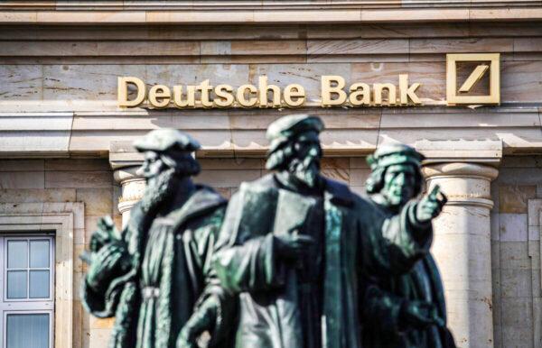 The logo of Deutsche Bank is seen on one of their branches in Frankfurt am Main, western Germany, on Feb. 4, 2021. (Armando Babani/AFP via Getty Images)