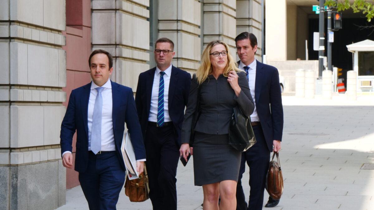The trial attorneys from the office of special counsel John Durham arrive for a hearing at the federal courthouse in Washington on April 27, 2022. (Oliver Trey for The Epoch Times)