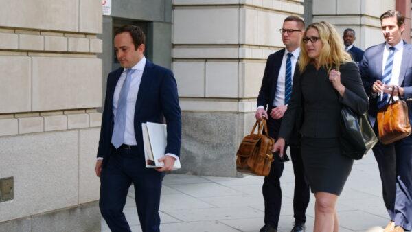 The trial attorneys from the office of special counsel John Durham, including Deborah Brittain Shaw, arrive for a hearing at the federal courthouse in Washington on April 27, 2022. (Oliver Trey for The Epoch Times)