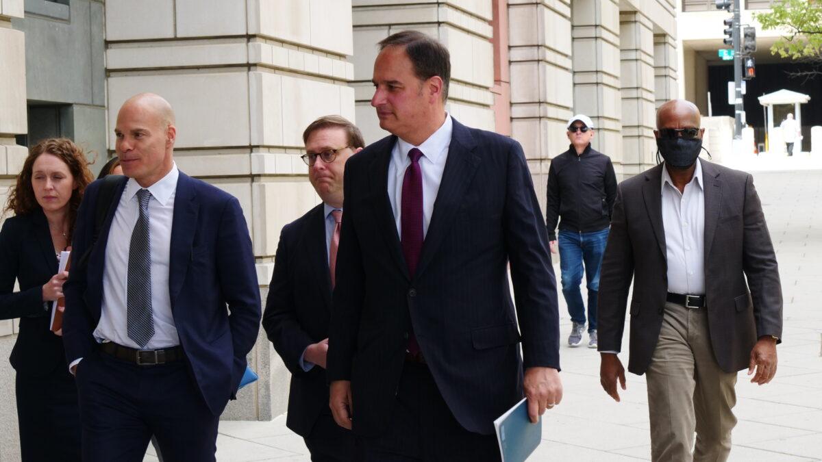 Michael Sussman (C) arrives for a court hearing at a federal courthouse in Washington on April 27, 2022. (Oliver Trey/The Epoch Times)