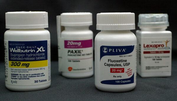 Bottles of antidepressant pills named (L-R) Wellbutrin, Paxil, Fluoxetine and Lexapro are shown photographed in Miami, Florida on March 23, 2004. (Photo Illustration by Joe Raedle/Getty Images)