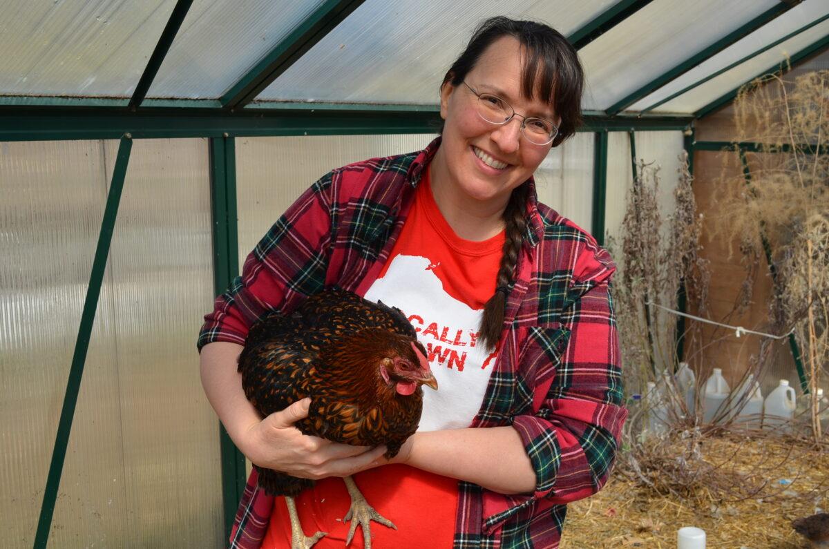 Laurie Neverman of Common Sense Home with Miss Mimi, a golden laced Wyandotte. (Courtesy of Laurie Neverman)