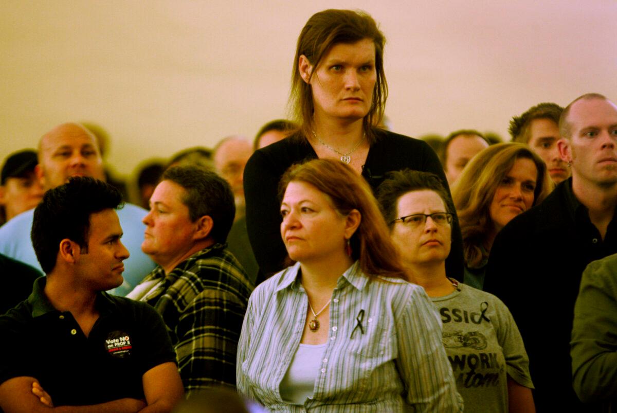 Members of the community listen to speakers during a rally at the San Diego Lesbian Gay Bisexual Transgender Community Center in San Diego on November 5, 2008. (Sandy Huffaker/Getty Images)