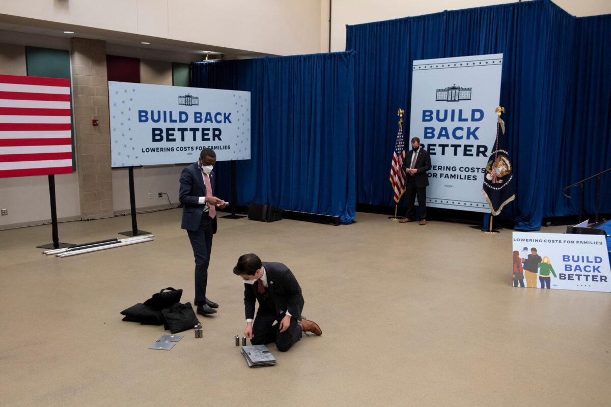 Build Back Better signage is seen as White House staff pack up after an event about health care and prescription drug prices at Germanna Community College in Culpeper, Va., on Feb. 10, 2022. (Brendan Smialowski/AFP via Getty Images)
