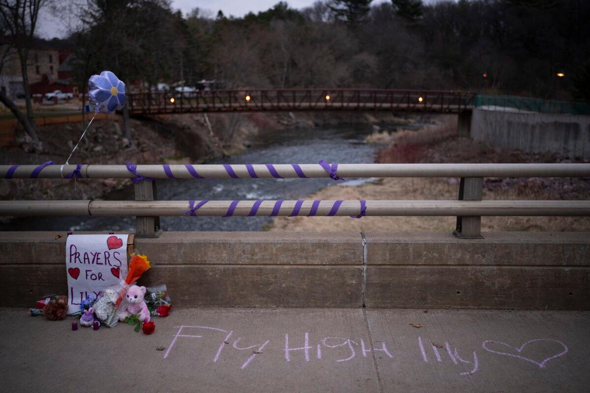 A memorial for 10-year-old Iliana "Lily" Peters is displayed on Jefferson Ave. in Chippewa Falls, Wis., in the evening of April 25, 2022. (Jeff Wheeler/Star Tribune via AP)