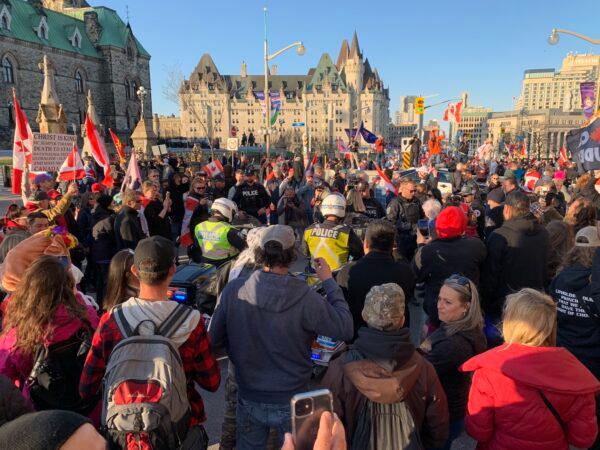 Protesters asking for upholding freedom gather by Parliament Hill in Ottawa on April 29, 2022. (Jonathan Ren/The Epoch Times)