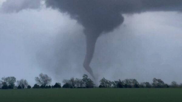 A tornado rips through Andover, Kan., on April 29, 2022, in a still from video. (Corey Novascone/@cfromtheict via AP/Screenshot via The Epoch Times)