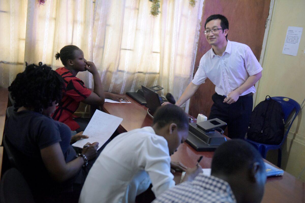 A Chinese language teacher talks to students at the Confucius Institute at the University of Lagos in Nigeria on April 6, 2016. (Pius Utomi Ekpei/AFP via Getty Images)