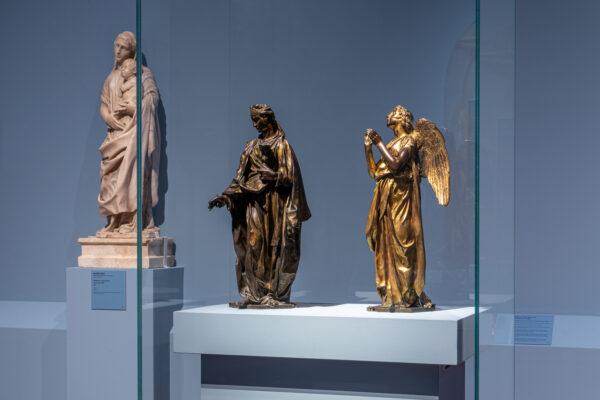 Donatello's recently restored gilded bronze figures "Faith" (C) and "Hope" (R) are on display in the Palazzo Strozzi, in Florence. (Ela Bialkowska/OKNO Studio)