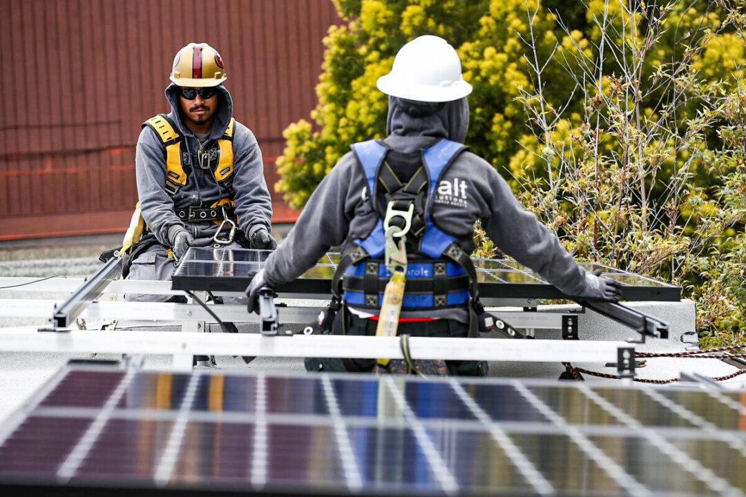 Biden Invokes Defense Production Act to Push Green Agenda