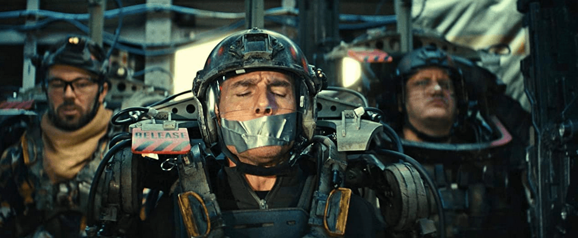 J-Squad has insured that the loquacious major (Tom Cruise) doesn't disturb their flight with his non-stop whining, in "Edge of Tomorrow." (Warner Bros. Pictures)