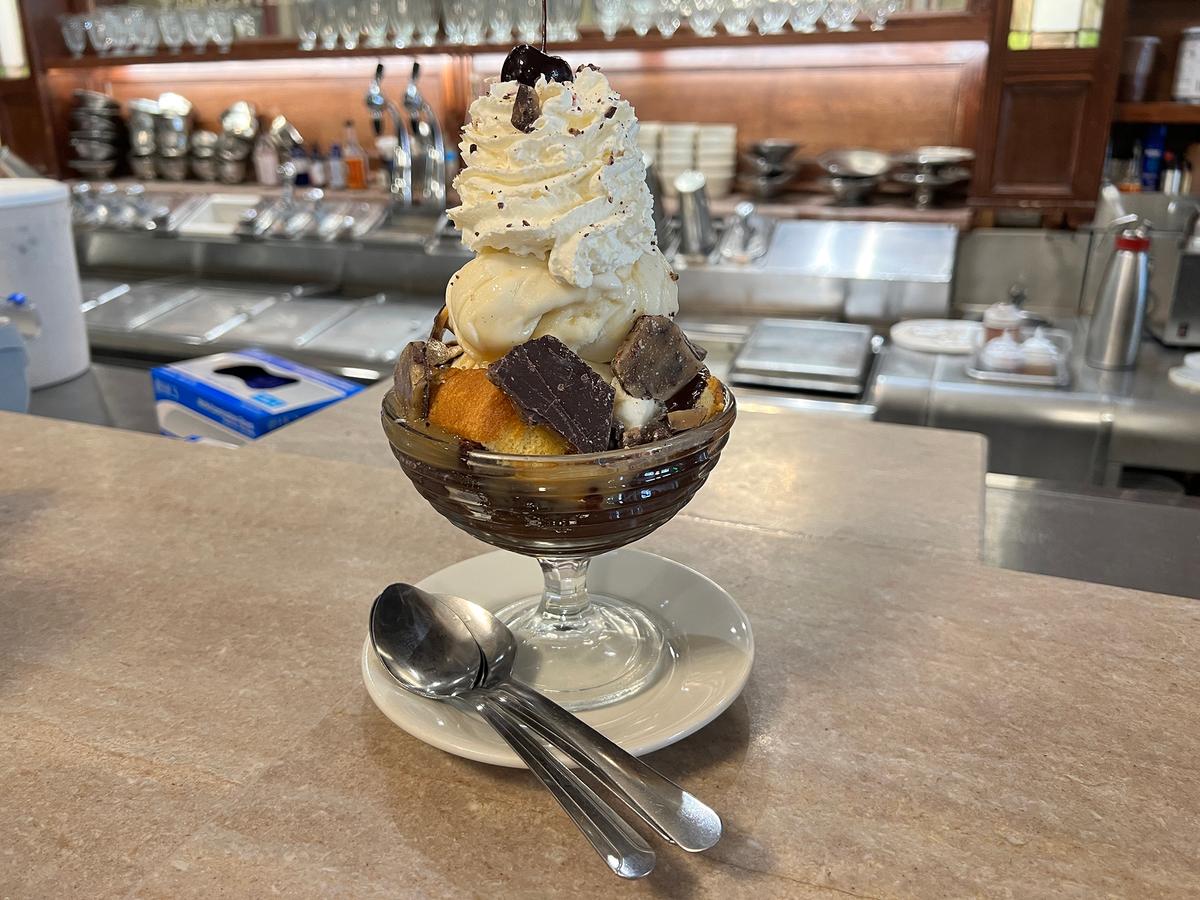 The Great Smoky Mountain sundae from Phoenix Pharmacy and Fountain includes a fudge-soaked brownie, Italian sponge cake, cacao nibs and house-made vanilla bean ice cream. Every treat at the fountain is made in-house. (Mary Ann Anderson/TNS)