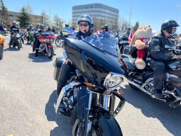 Stephany Crowley, an independent marketer, at the Rolling Thunder Bikers Convoy on May 1, 2022. (Annie Wu/The Epoch Times)
