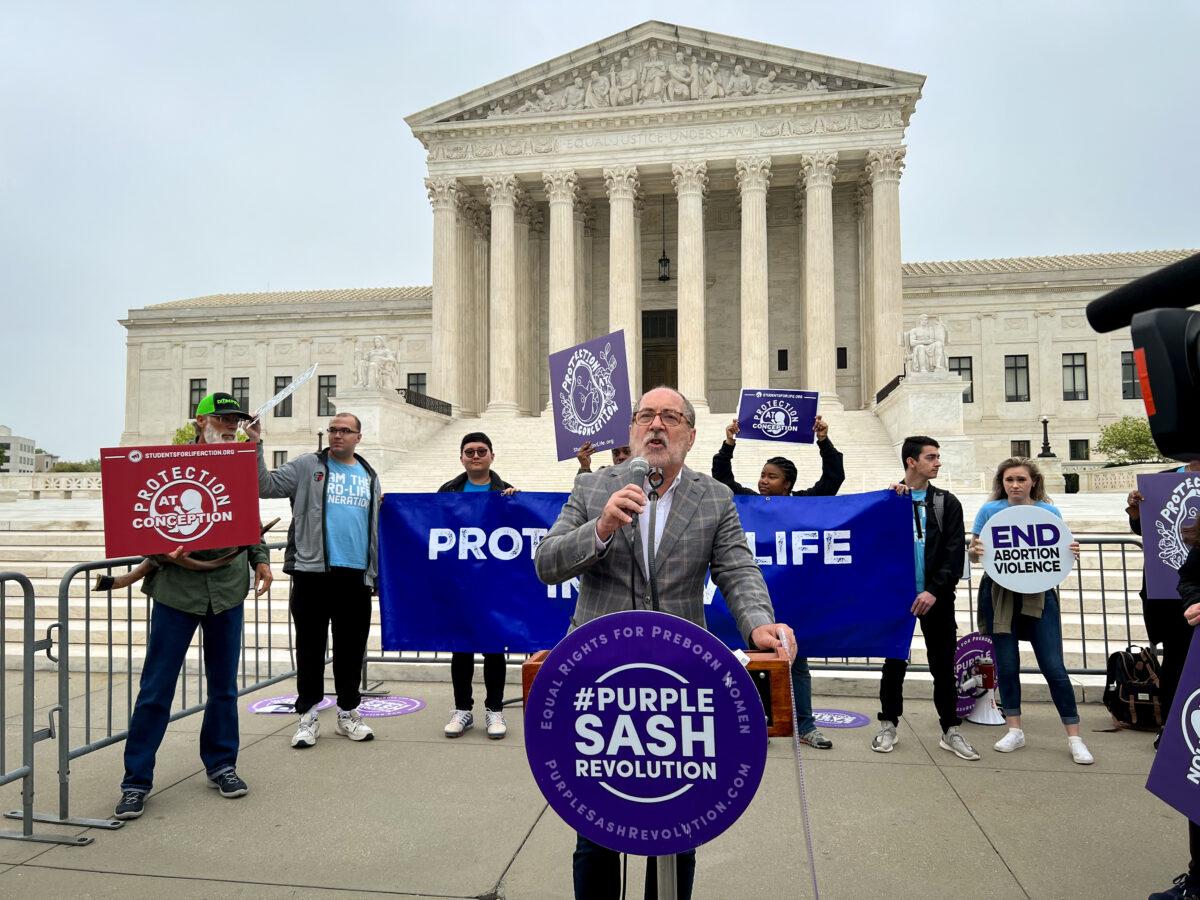 Patrick Mahoney, chief strategy officer for the pro-life organization Stanton Public Policy Center, speaks during the protests outside of the Supreme Court building in Washington, on May 3, 2022. (Emel Akan/The Epoch Times)