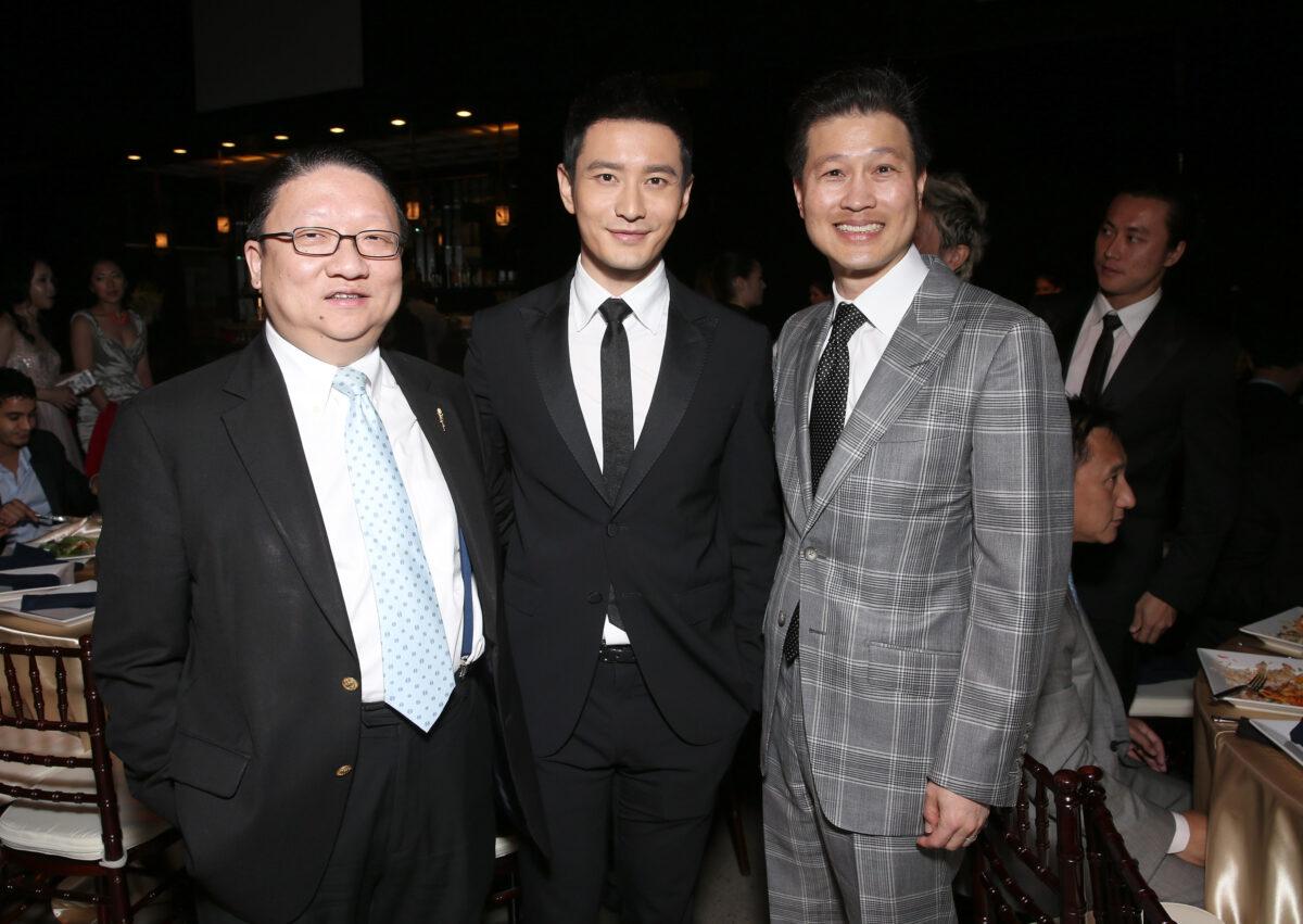 EDI Media Chairman James Su, Huang Xiaoming, and East West Bank CEO Dominic Ng (R) attend the "88th Birthday Commemoration of TCL Chinese Theater IMAX" held at the TCL Chinese Theater in Hollywood, Calif., on June 3, 2015. (Todd Williamson/Getty Images for Sun Seven Stars Media)