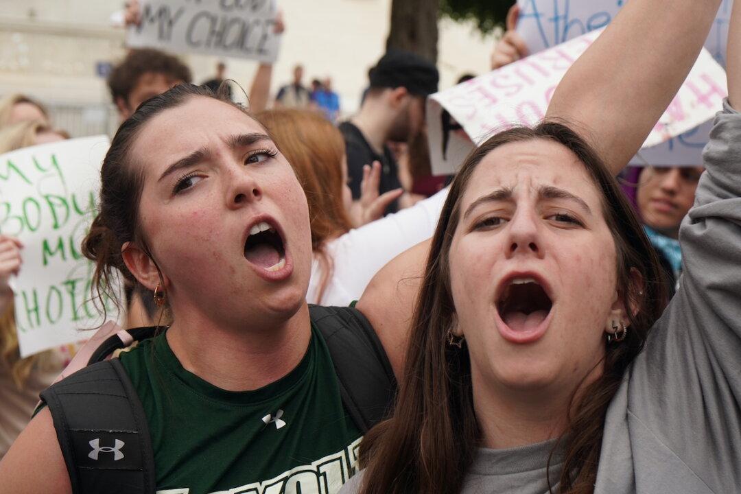 Pro-Life and Pro-Abortion Protesters Shout Outside the Supreme Court