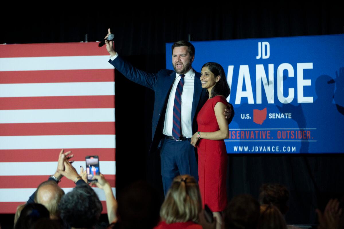 J.D. Vance, a Republican candidate for the U.S. Senate in Ohio, and his wife Usha Vance wave to supporters after winning the Ohio Republican Senate primary election at an election night event at Duke Energy Convention Center in Cincinnati, Ohio, on May 3, 2022. (Drew Angerer/Getty Images)