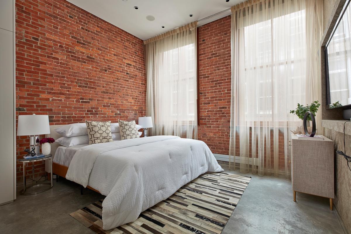 Exposed brick is left untouched in order to enhance an industrial feel. (Scott Gabriel Morris/TNS)