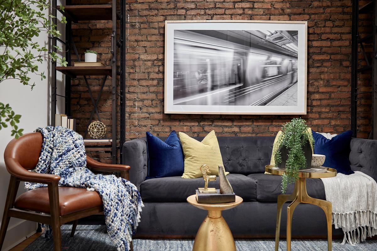 Graphic artwork helps to provide an industrial feel in this den space. (Scott Gabriel Morris/TNS)
