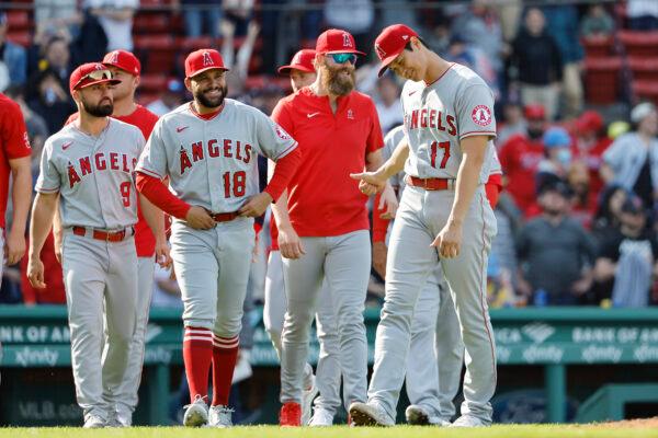 Shohei Ohtani #17 of the Los Angeles Angels has a laugh with teammates after their 8-0 win over the Boston Red Sox at Fenway Park, in Boston, on May 5, 2022. (Winslow Townson/Getty Images)