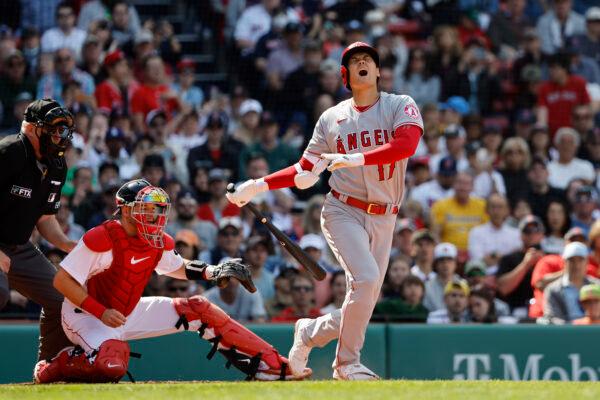 Shohei Ohtani #17 of the Los Angeles Angels reacts to fouling a ball off himself during the seventh inning against the Boston Red Sox at Fenway Park, in Boston, on May 5, 2022. (Winslow Townson/Getty Images)