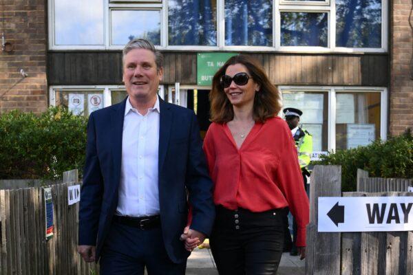 Britain's main opposition Labour Party leader Keir Starmer and his wife Victoria leave a polling station after casting their vote in local elections, in London, on May 5, 2022. (Daniel Leal /AFP via Getty Images)