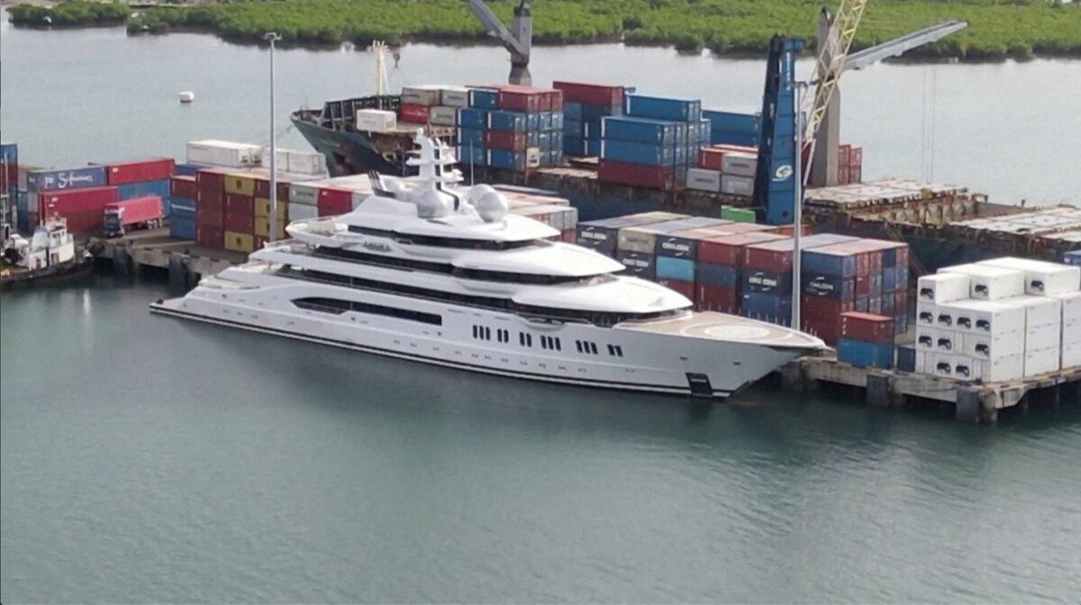 A screengrab from a drone video footage shows the Russian-owned superyacht Amadea docked at Queens Wharf in Lautoka, Fiji, on May 3, 2022. (Screenshot via Reuters TV)