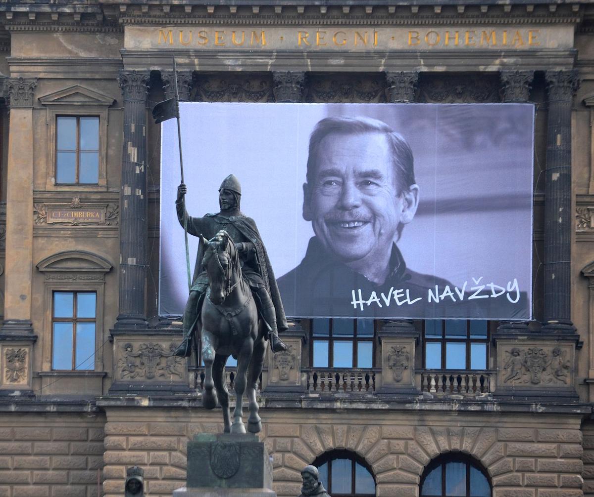 A large portrait of former President of Czechoslovakia and Czech Republic Vaclav Havel with the sign "Havel Forever" hangs on the National Museum behind the St. Wenceslas statue on the 25th anniversary of the Velvet Revolution in Prague, Czech Republic, on Nov. 17, 2014. (Matej Divizna/Getty Images)