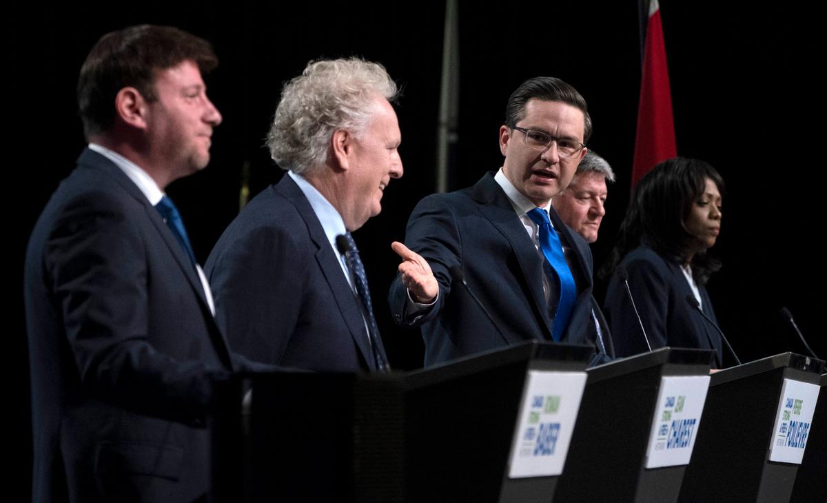 Poilievre and Charest Spar Over Trucker Convoy Protest During Leadership Debate