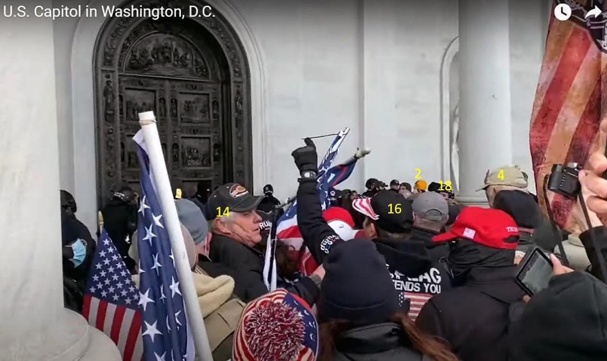 The 17-foot-high bronze Columbus Doors at the U.S. Capitol were closed when protesters and suspicious actors pushed past police on the east steps on Jan. 6, 2021. The 20,000-pound doors can only be opened from inside. (Attorney Brad Geyer/Screenshot via The Epoch Times)