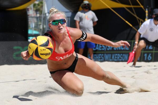 In this handout image provided by AVP, Sara Hughes competes against Sarah Sponcil and Kelly Claes in the semifinals during the Monster Hydro Cup, in Long Beach, Calif., on July 19, 2020 (Mpu Dinani/Getty Images)