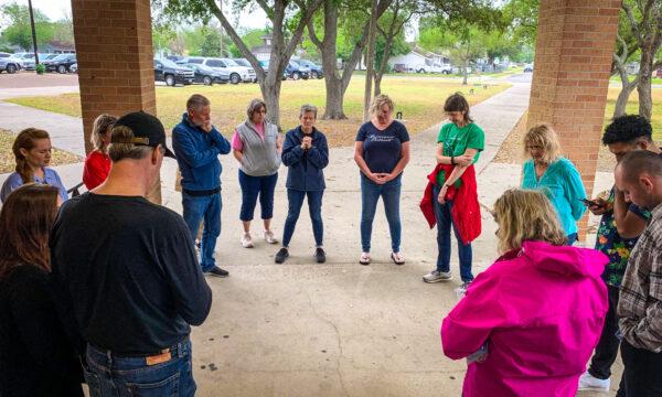 Members of the County Citizens Defending Freedom chapter in Nueces County, Texas, gather on April 20, 2022 to pray before asking a School Health Advisory Council in Corpus Christi to reject the Making Proud Choices! sex-ed curriculum. (Courtesy of Colby Wiltse, executive director of CCDF-Nueces County)