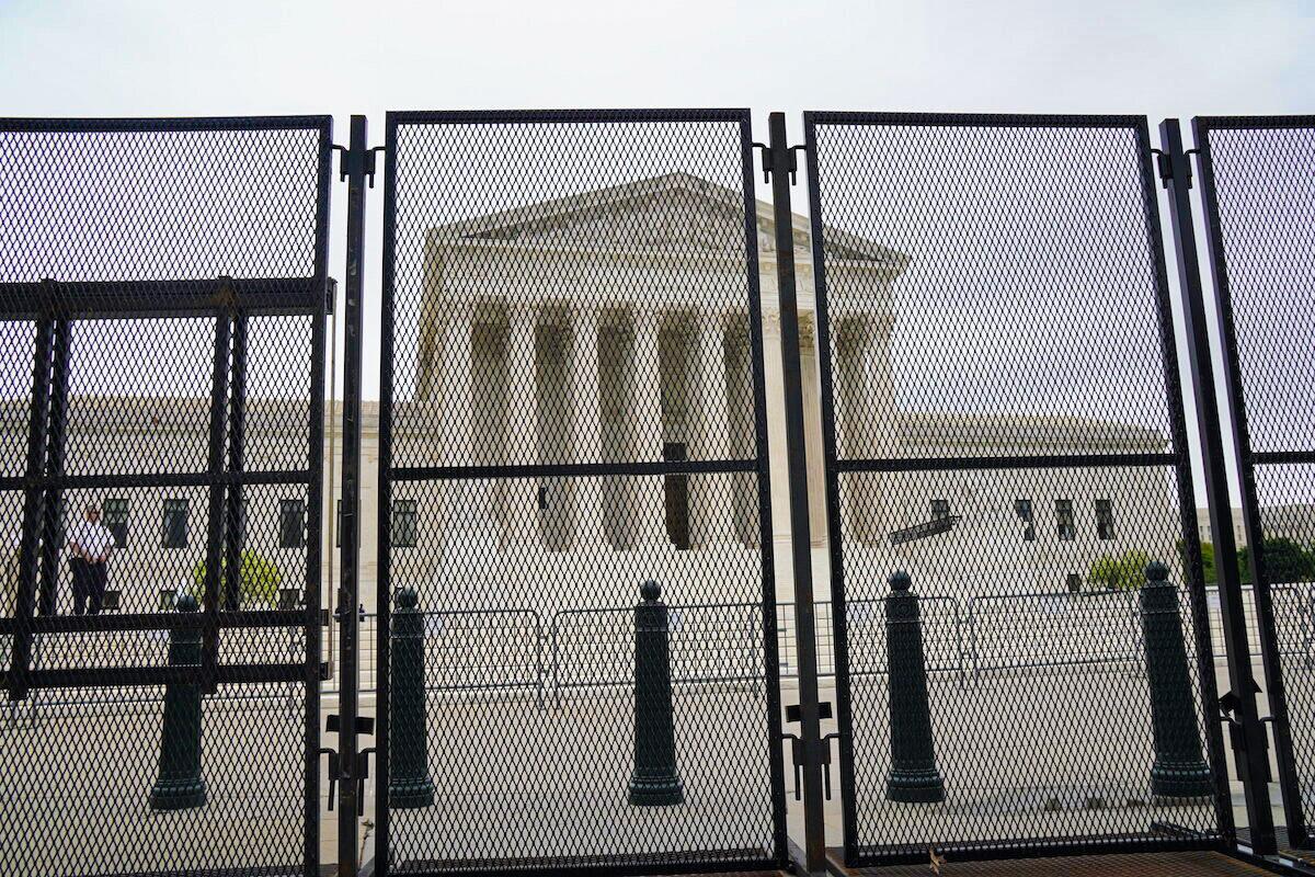 Tall, heavy barricades surround the U.S. Supreme Court in Washington, on May 5, 2022. (Jackson Elliot/The Epoch Times)
