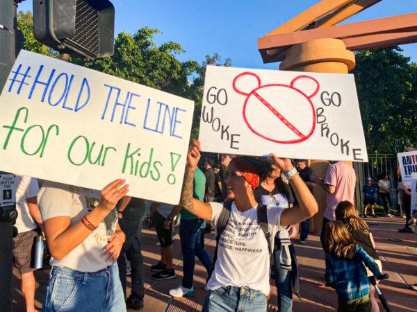Protesters rally in opposition to the Walt Disney Co.'s stance against a recently enacted Florida law outside of the company's headquarters in Burbank, Calif., on April 6, 2022. (Jill McLaughlin/The Epoch Times)