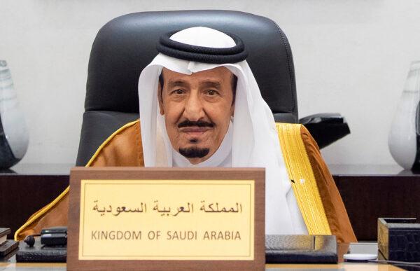 Saudi King Salman bin Abdulaziz attends the G-20 Leaders' Summit via videoconference at the royal palace in Riyadh, Saudi Arabia, on Oct. 30, 2021. (Bandar Aljaloud/Saudi Royal Palace via AP)