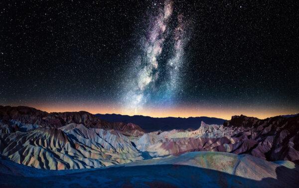 The Milky Way over Zabriskie Point with the Panamint Range glowing in distance in the Mojave Desert in Nevada. (Matt Anderson Photography/Moment/GettyImages)