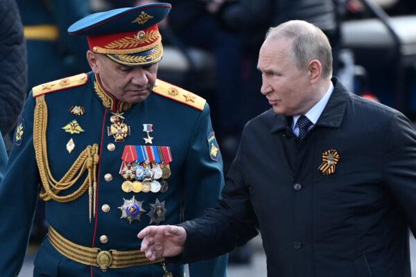 President Vladimir Putin and Defense Minister Sergei Shoigu in Red Square after a Victory Day military parade in central Moscow, on May 9, 2022. (Kirill Kudryavtsev/AFP via Getty Images)