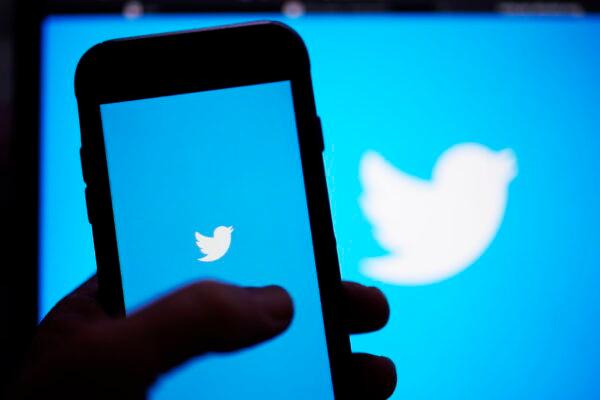 The Twitter application is seen on a digital device on April 25, 2022. (Gregory Bull/AP Photo)