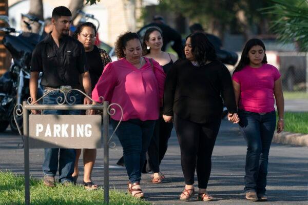 People leave a funeral home after attending a visitation for Amerie Garza, a 10-year-old victim who was killed in last week's elementary school shooting in Uvalde, Texas, on May 30, 2022. (Jae C. Hong/AP Photo)