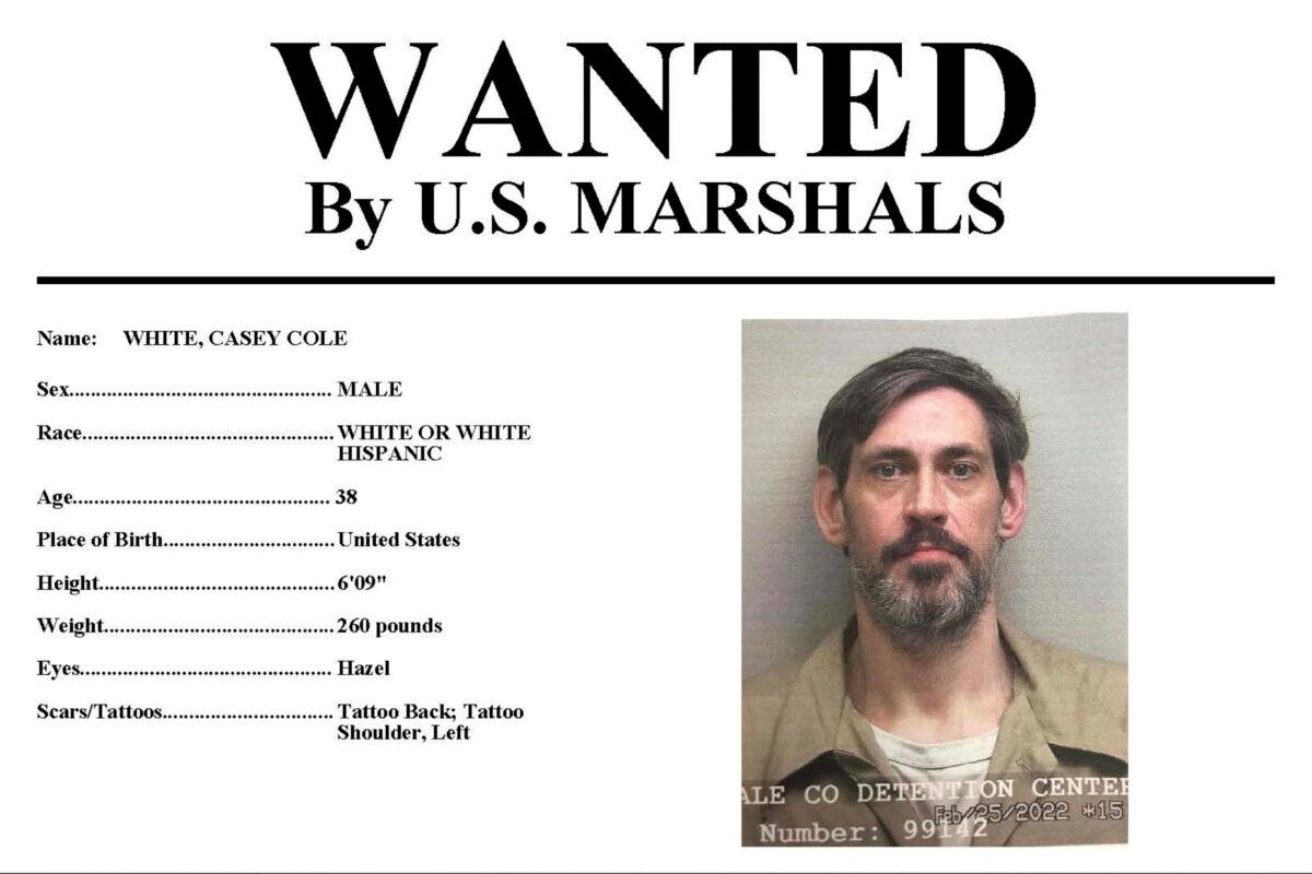 Part of a wanted poster for Casey Cole White. (U.S. Marshals Service via AP)