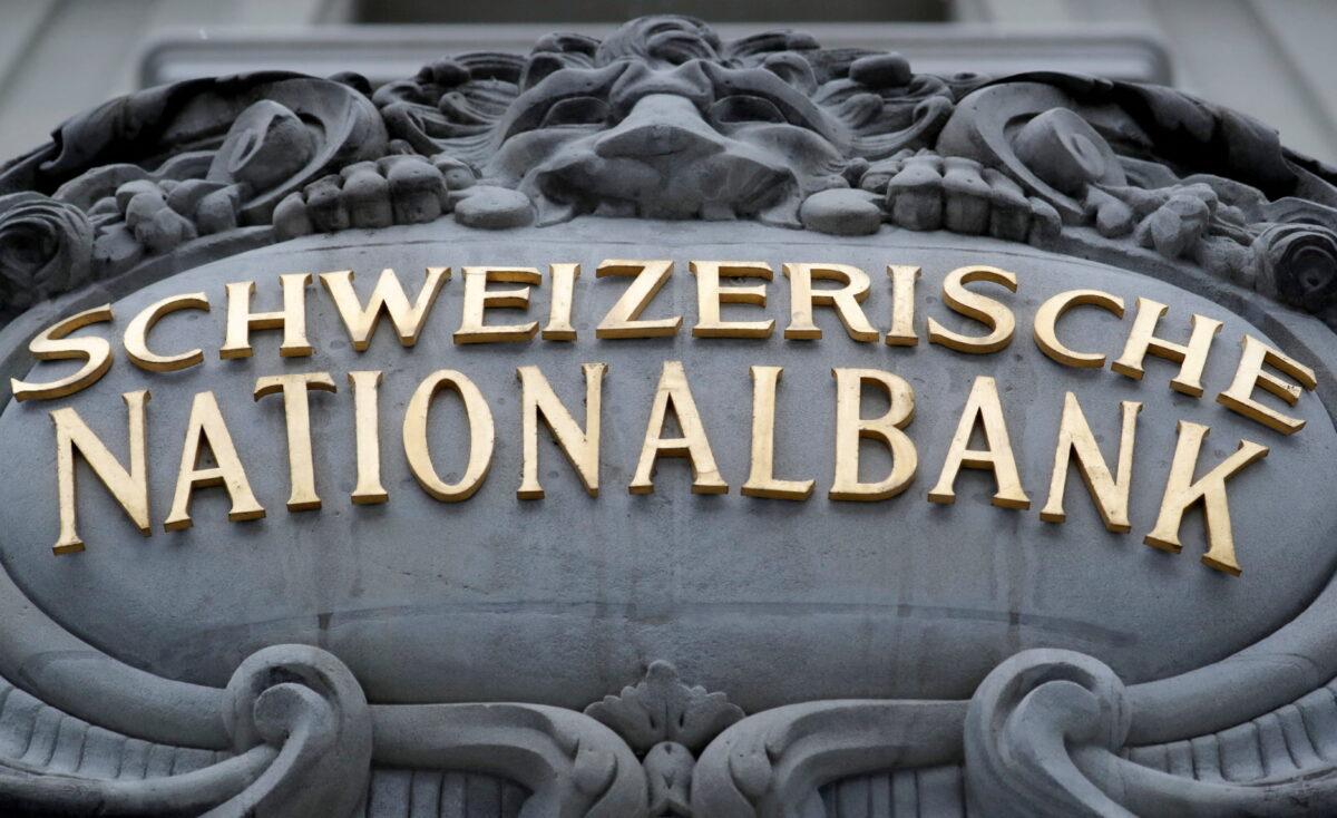 The Swiss National Bank (SNB) logo is pictured on its building in Bern, Switzerland, on April 2, 2022. (Arnd Wiegmann/Reuters)