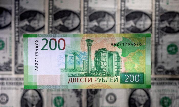 Russian Ruble Firms Past 57 to the Dollar for First Time in Four Years