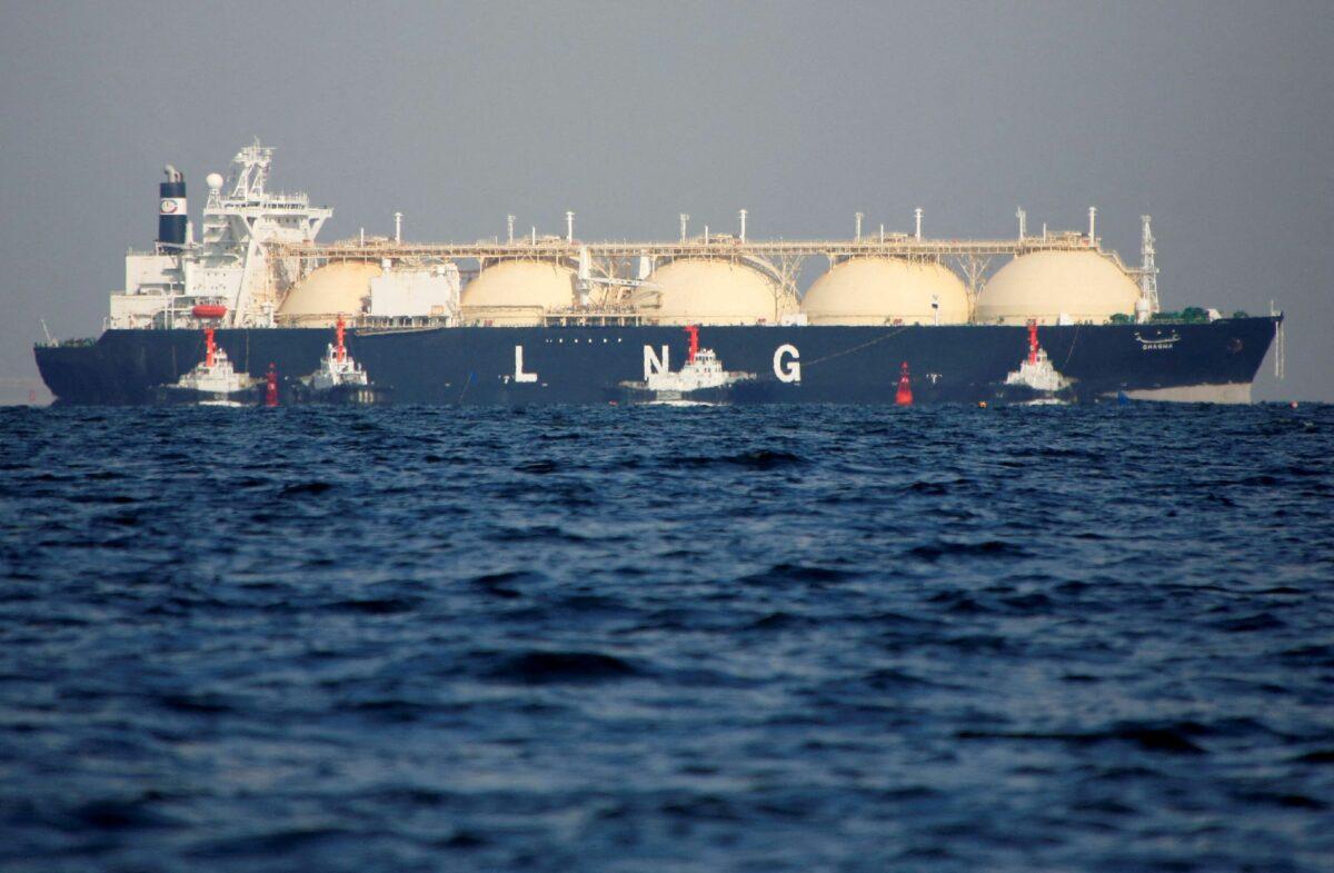 A liquefied natural gas tanker is tugged toward a thermal power station in Futtsu, Japan, on Nov. 13, 2017. (Issei Kato/Reuters)