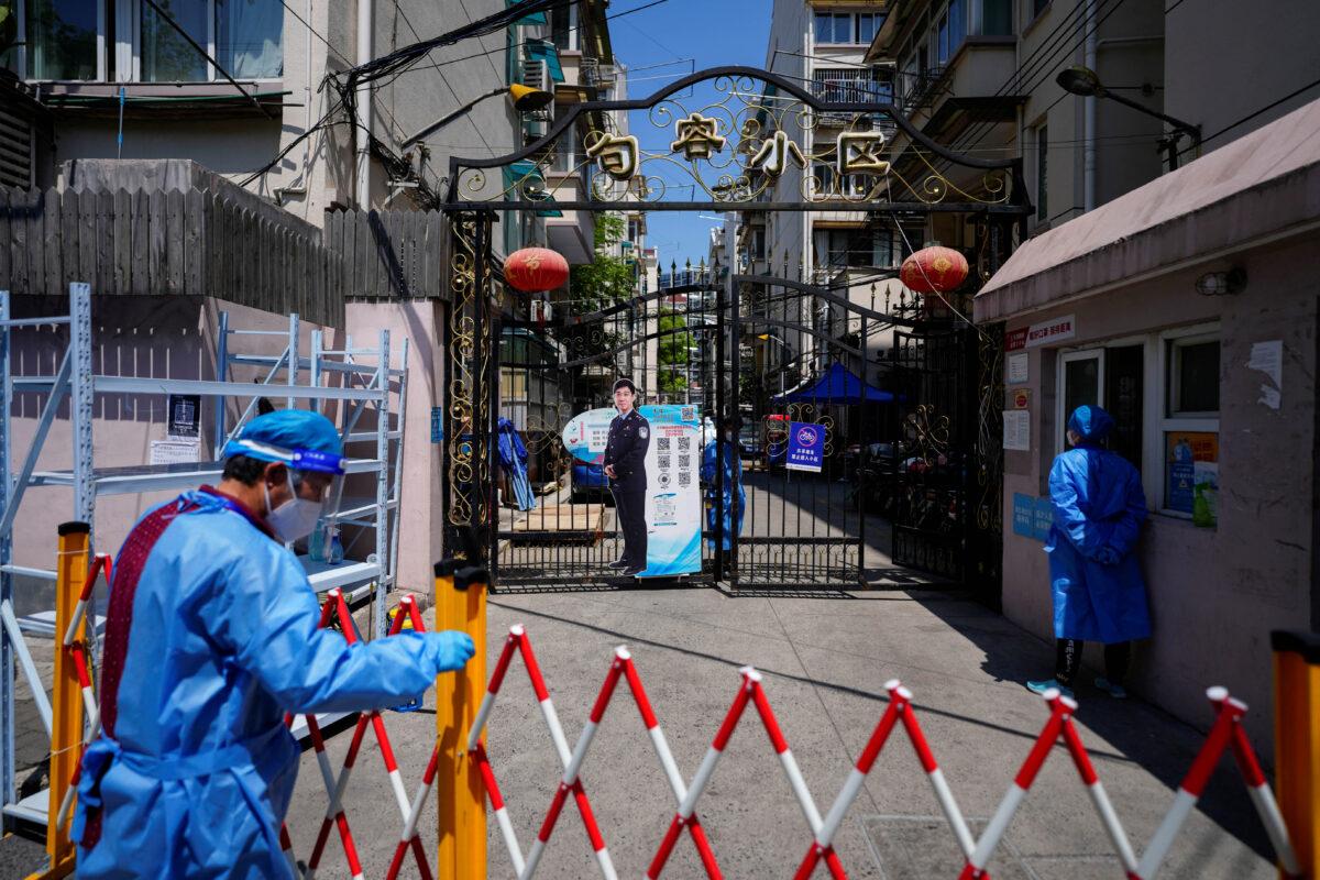 The closed entrance of a residential area is pictured during the COVID-19 lockdown in Shanghai, China, on May 5, 2022. (Aly Song/Reuters)