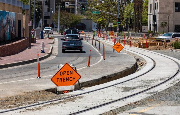 Construction for an upcoming streetcar system is underway in Santa Ana, Calif., on May 4, 2022. (John Fredricks/The Epoch Times)