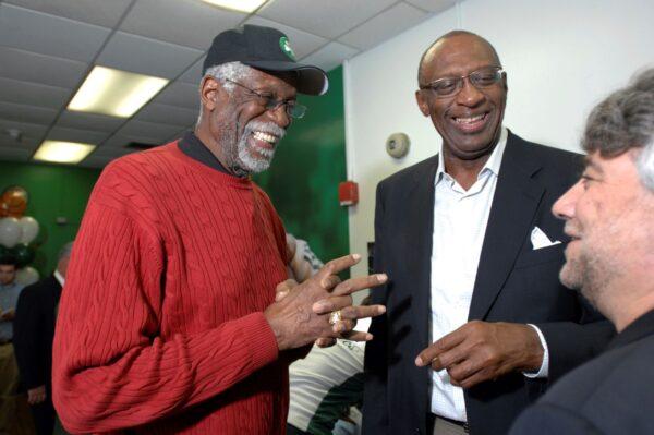 Former NBA players Bill Russell and Bob Lanier (R) share a laugh during the ceremonial opening of a new reading and learning center at a community center in Boston on June 6, 2008. (Josh Reynolds/AP Photo)