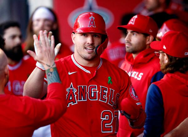 Mike Trout #27 of the Los Angeles Angels celebrates a run against the Tampa Bay Rays in the first inning at Angel Stadium of Anaheim, in Anaheim, Calif., on May 10, 2022. (Ronald Martinez/Getty Images)