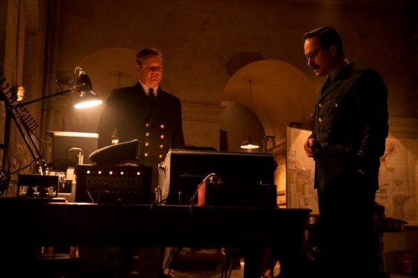 Colin Firth (L) as Ewan Montigu and Matthew Macfadyen as Charles Cholmondeley in “Operation Mincemeat.” (Netflix)