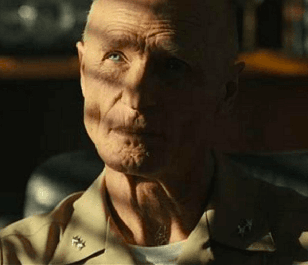 Ed Harris as a rear admiral wishing he could throw Maverick out of the Navy, in "Top Gun: Maverick." (Paramount Pictures)